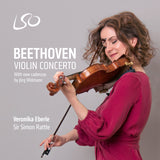 Grey album cover featuring violinist Veronika Eberle playing the violin. She has reddish brown hair and wears a dark pink dress. Text reads Beethoven Violin Concerto, with new cadenzas by Jorg Widmann, Veronika Eberle, Sir Simon Rattle.